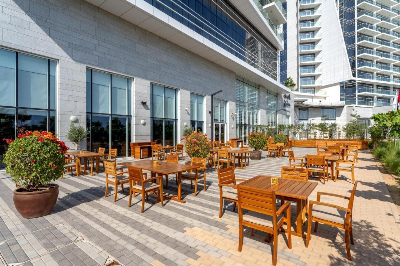 Hotel Radisson Dubai Damac Hills Exterior foto