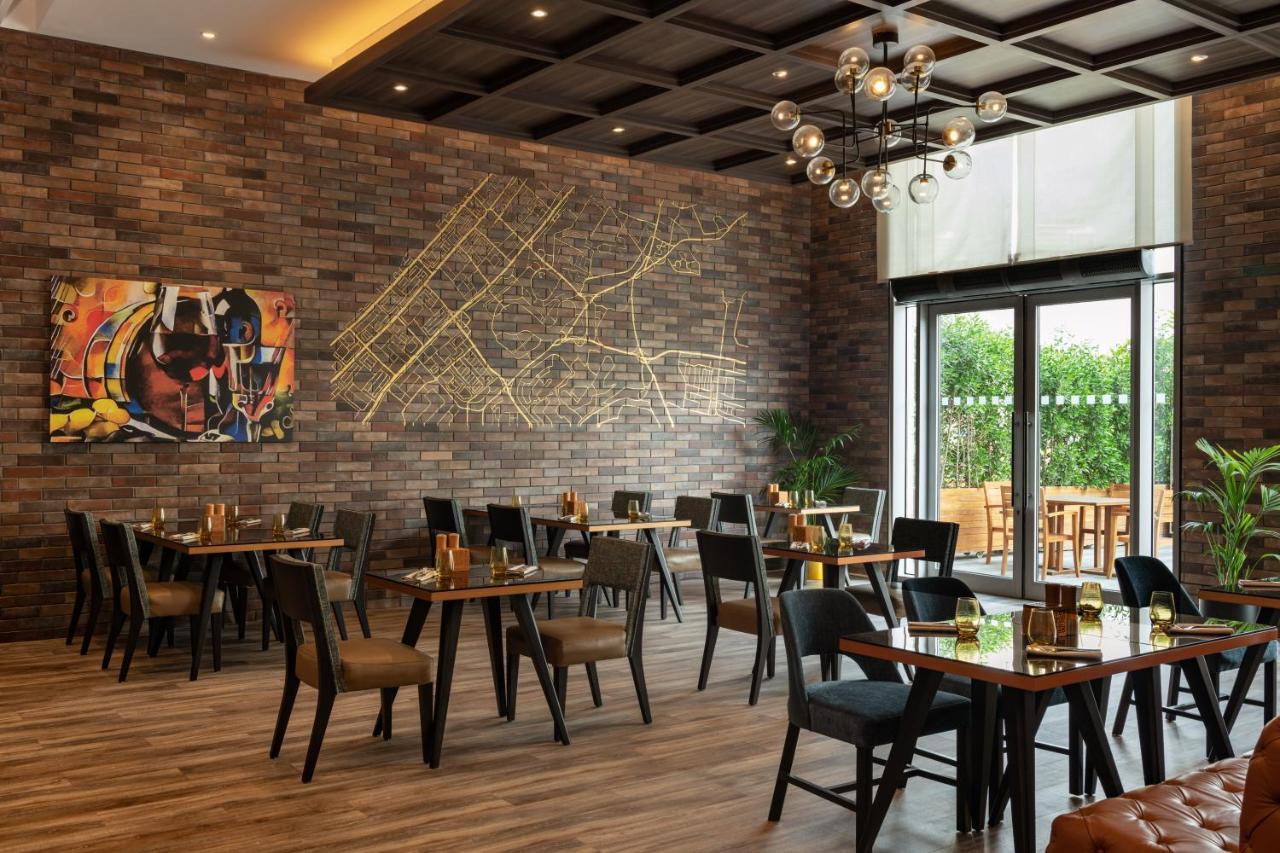 Hotel Radisson Dubai Damac Hills Exterior foto