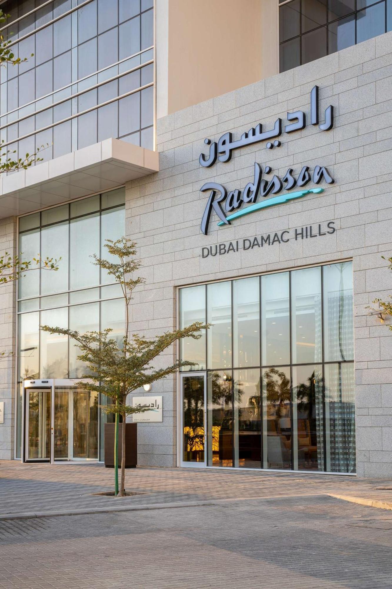 Hotel Radisson Dubai Damac Hills Exterior foto